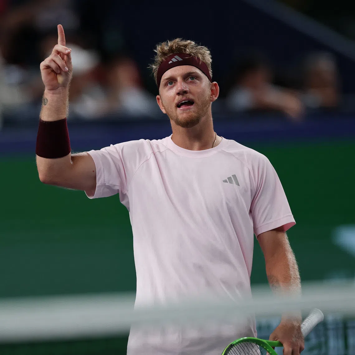 Alejandro Davidovich Fokina celebrates after beating German Alexander Zverev in Shanghai.