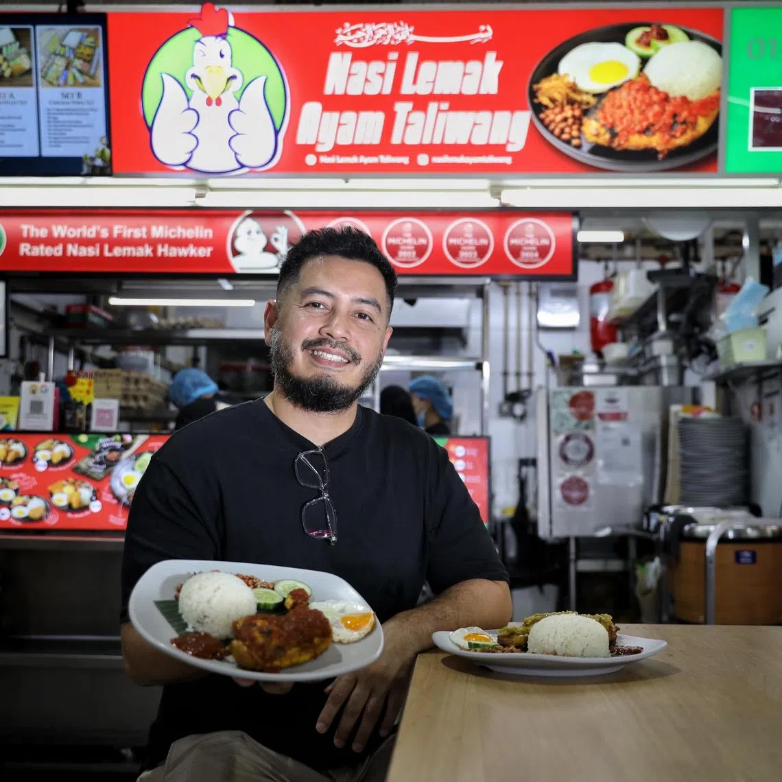 Mr Noorman Mubarak quit his job to become a full-time hawker in 2017.  Today, he runs a nasi lemak chain that has 26 outlets.