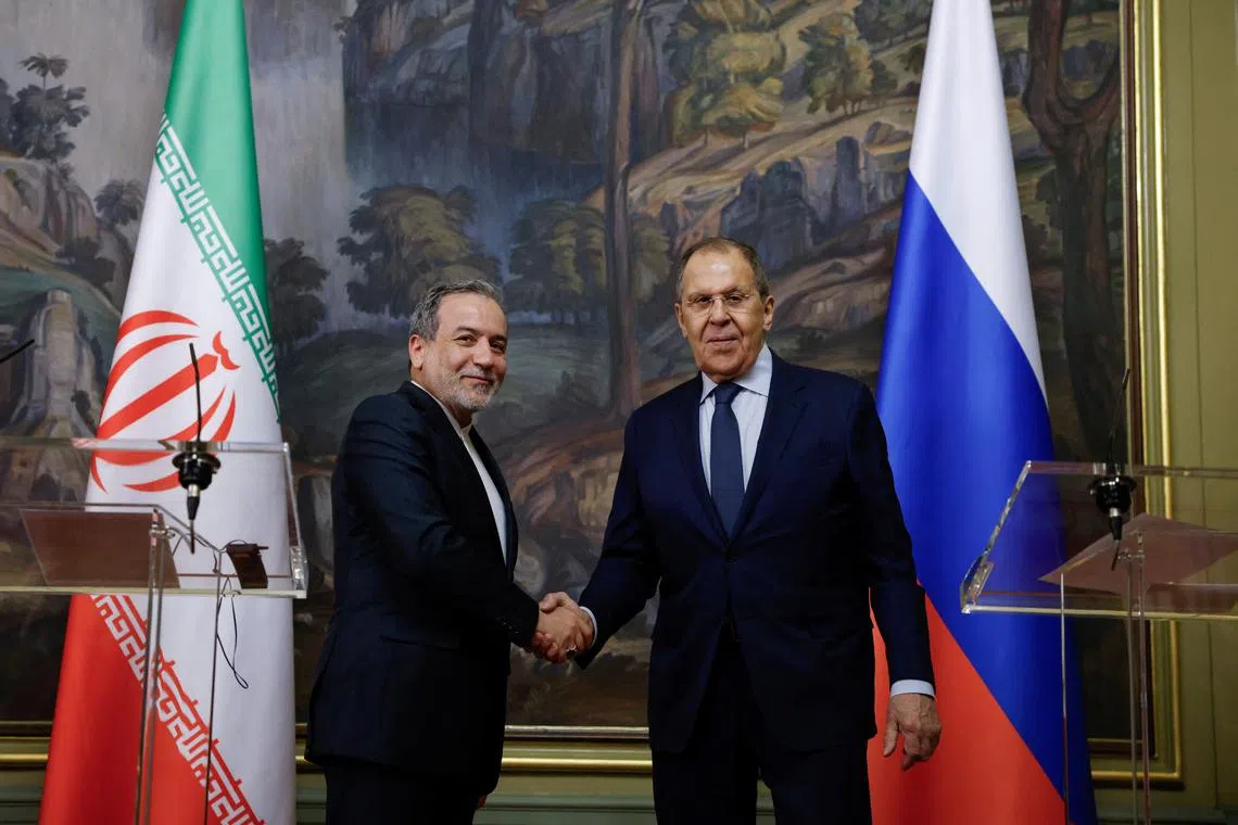 FILE PHOTO: Russia's Foreign Minister Sergei Lavrov and Iran's Foreign Minister Abbas Araqchi shake hands during a press conference following their talks in Moscow, Russia, April 18, 2025. Tatyana Makeyeva/Pool via REUTERS/File Photo