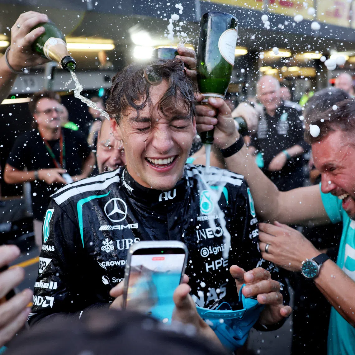 Formula One F1 - Azerbaijan Grand Prix - Baku City Circuit, Baku, Azerbaijan - September 26, 2026 Mercedes' George Russell celebrates after winning the race REUTERS/Jakub Porzycki