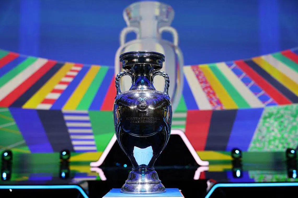 FILE PHOTO: Soccer Football - Euro 2024 Qualifying Draw - Festhalle, Frankfurt, Germany - October 9, 2022 The European Championship trophy is seen before the draw REUTERS/Kai Pfaffenbach/File Photo