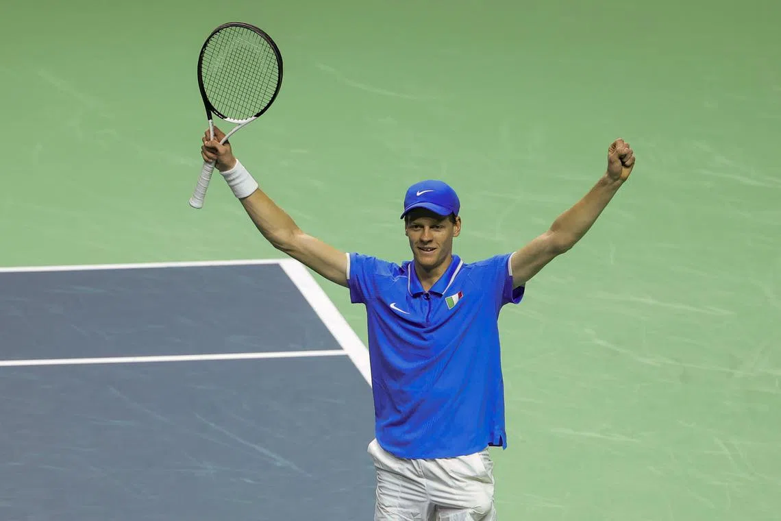 Jannik Sinner of Italy celebrates winning against Tallon Griekspoor of the Netherlands during their match at the Davis Cup final.