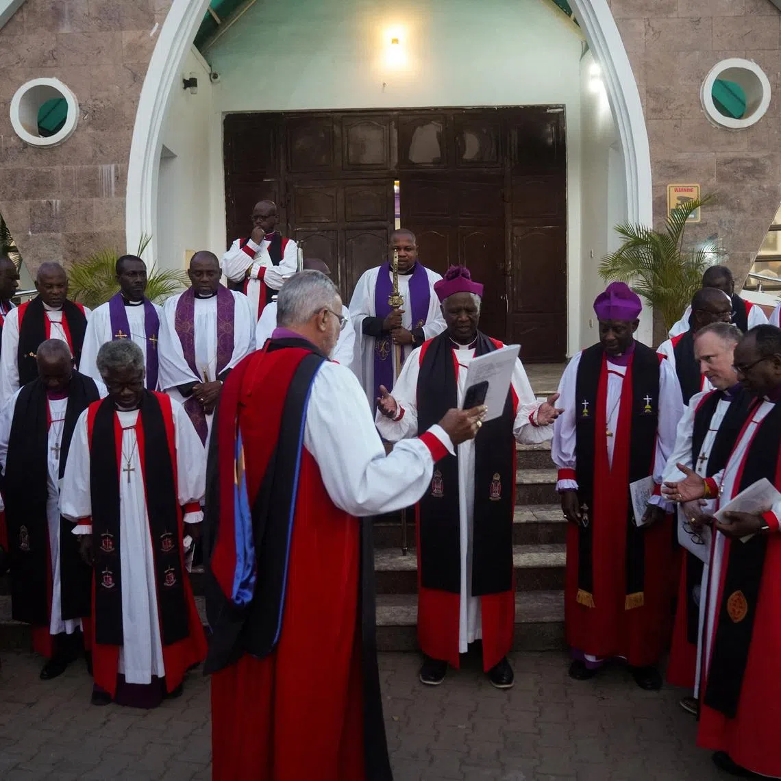 Archbishop Laurent Mbanda of Rwanda, newly elected chairman of the Global Anglican Council, prays with other members after the closing service of the GAFCON G26 council in Abuja, Nigeria, March 6, 2026. REUTERS/Marvellous Durowaiye