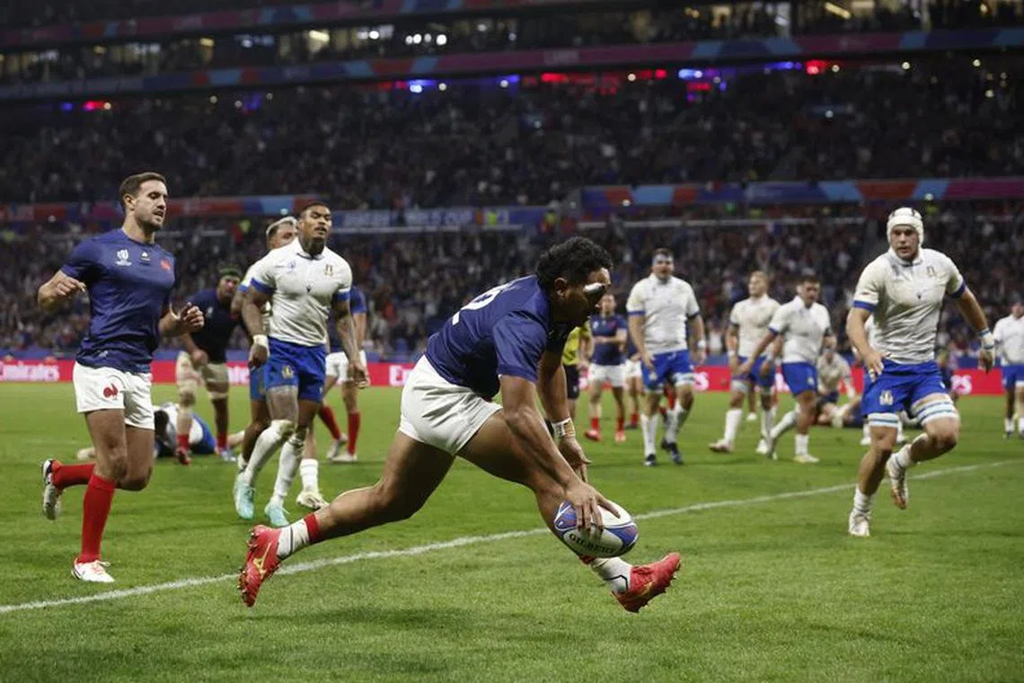 Rugby Union - Rugby World Cup 2023 - Pool A - France v Italy - Groupama Stadium, Lyon, France - October 6, 2023 France's Yoram Moefana scores their sixth try REUTERS/Benoit Tessier