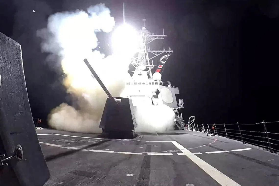 A Tomahawk land attack missile (TLAM) is launched from the U.S. Navy Arleigh Burke-class guided missile destroyer USS Gravely against what the U.S. military describe as Houthi military targets in Yemen, February 3, 2024.  U.S. Central Command/Handout via REUTERS