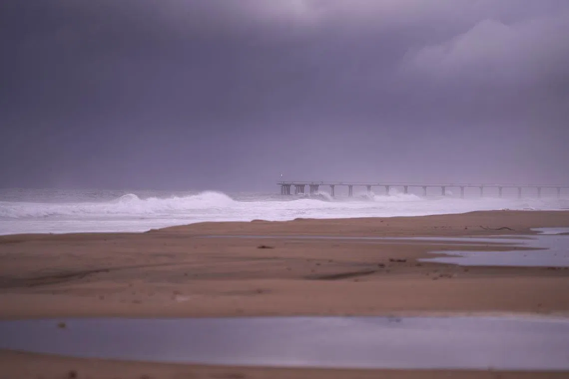 The Hermosa Beach pier is seen among fog and high surf during a bomb cyclone rain storm in Los Angeles, California, USA, Jan 5, 2023. 