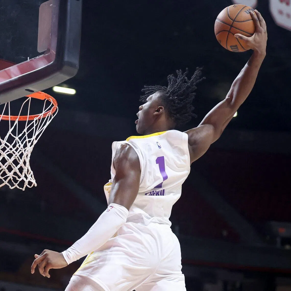 Adou Thiero of the Los Angeles Lakers dunking against the Golden State Warriors in the second half of a 2026 NBA Summer League semi-final game on July 18 in Las Vegas, Nevada.