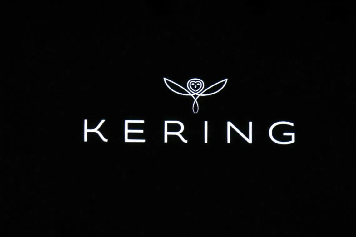 (FILES) A photo taken on June 18, 2013 shows the new name and logo of French luxury and retail group PPR , Kering, at an annual general meeting of the group in Paris during which shareholders agreed the group start a new life as a luxury and sports brands group by renaming itself Kering. French luxury giant Kering said on March 19, 2024, it is anticipating a 10-percent drop in year-on-year sales in the first quarter due to a decline in the performance of its flagship brand, handbag-maker Gucci. (Photo by FRANCOIS GUILLOT / AFP)