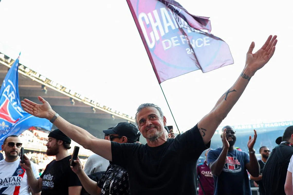 Soccer Football - Ligue 1 - Paris St Germain v Angers - Parc des Princes, Paris, France - April 5, 2025 Paris St Germain coach Luis Enrique celebrates after winning Ligue 1 Pool via REUTERS/Franck Fife