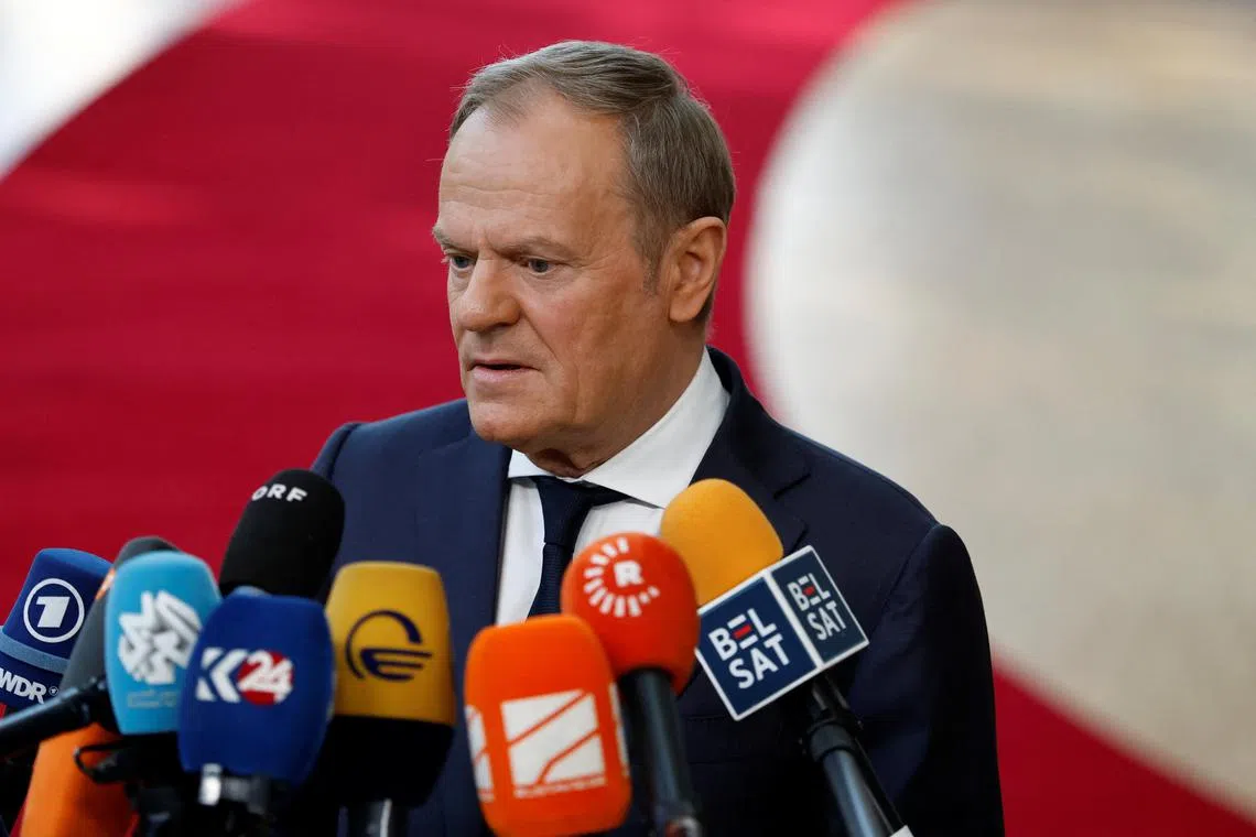 FILE PHOTO: Polish Prime Minister Donald Tusk speaks to the media on the day of a European Union leaders special summit to discuss Ukraine and European defence, in Brussels, Belgium March 6, 2025. REUTERS/Stephanie Lecocq/File Photo