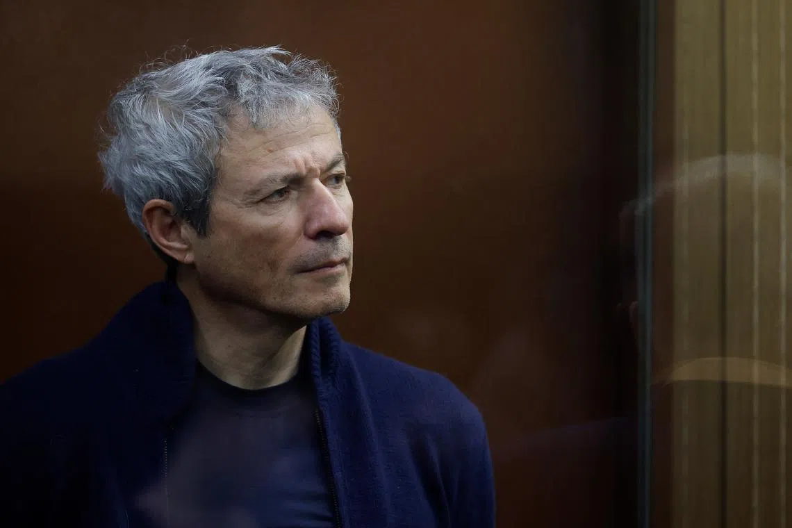 Vadim Moshkovich, founder of the country's top agriculture company Rusagro, who is charged with fraud, stands inside a defendants' cage during a court hearing on his detention in Moscow, Russia March 27, 2025. REUTERS/Maxim Shemetov/File Photo