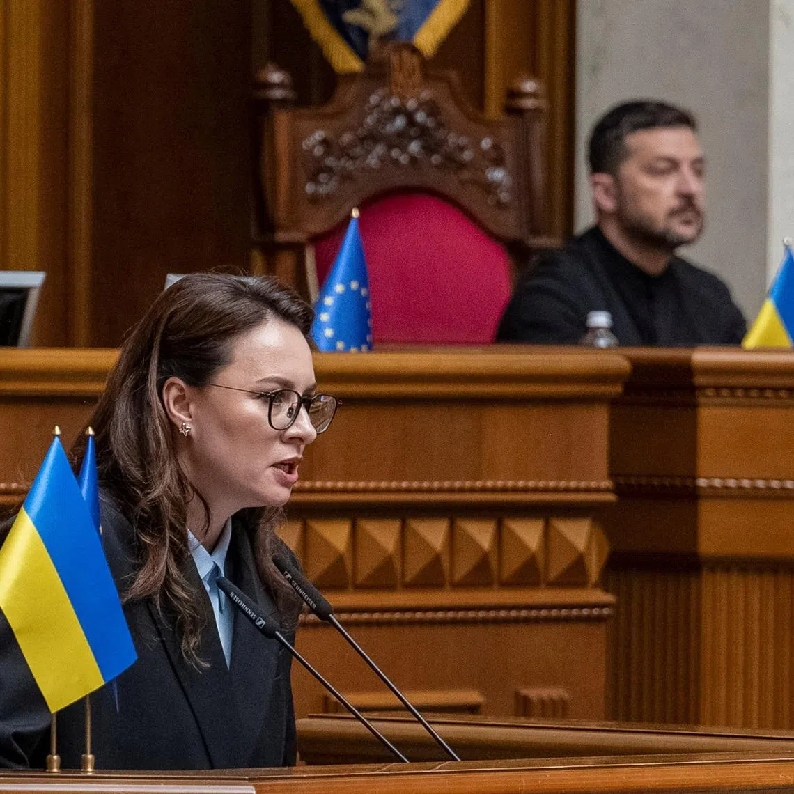 Ukrainian Prime Minister Yulia Svyrydenko (left) during a parliament session as President Volodymyr Zelensky looks on, in Kyiv, on July 17, 2025.