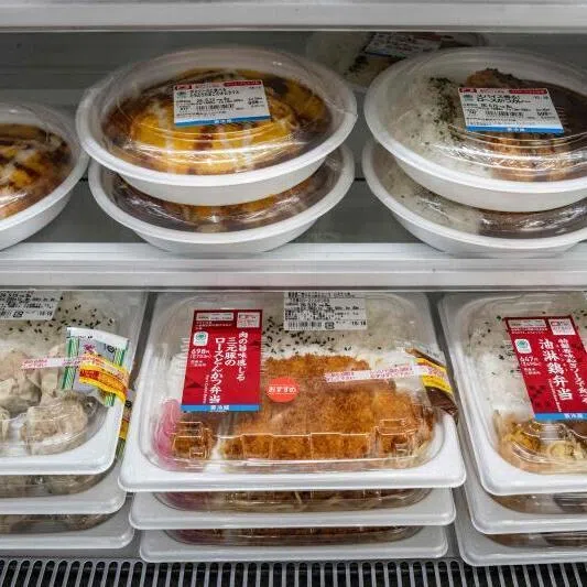 Japan's love of plastic is seen here in the rows of bento boxes at a convenience store.