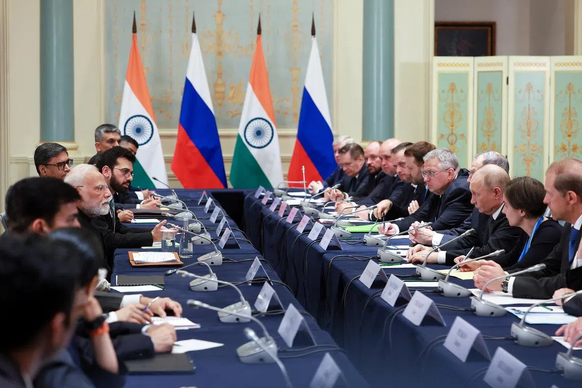 Members of the delegations, led by Russian President Vladimir Putin and Indian Prime Minister Narendra Modi, attend a meeting on the sidelines of the Shanghai Cooperation Organisation (SCO) summit in Tianjin, China, September 1, 2025. Sputnik/Vladimir Smirnov/Pool via REUTERS