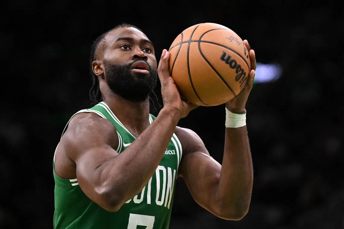 Dec 4, 2024; Boston, Massachusetts, USA; Boston Celtics guard Jaylen Brown (7) attempts a free throw against the Detroit Pistons during the fourth quarter at the TD Garden. Brian Fluharty-Imagn Images/File Photo