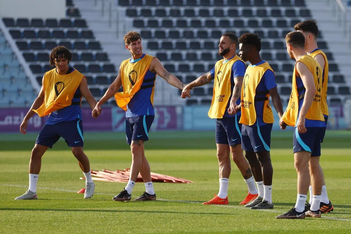 England's Trent Alexander-Arnold, John Stones, Kyle Walker, Bukayo Saka and teammates during a training session.
