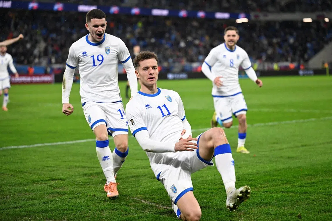 Soccer Football - FIFA World Cup - UEFA Qualifiers - Semi Final - Slovakia v Kosovo - National Football Stadium, Bratislava, Slovakia - March 26, 2026 Kosovo's Fisnik Asllani celebrates scoring their second goal REUTERS/Radovan Stoklasa