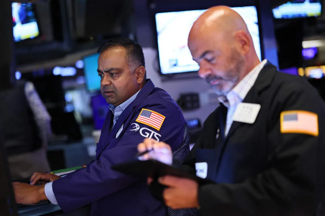 Traders working on the floor of the New York Stock Exchange, in New York City.