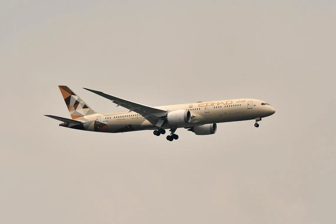 Etihad Airways aeroplane in the sky as viewed from Pulau Ubin on July 6, 2021.