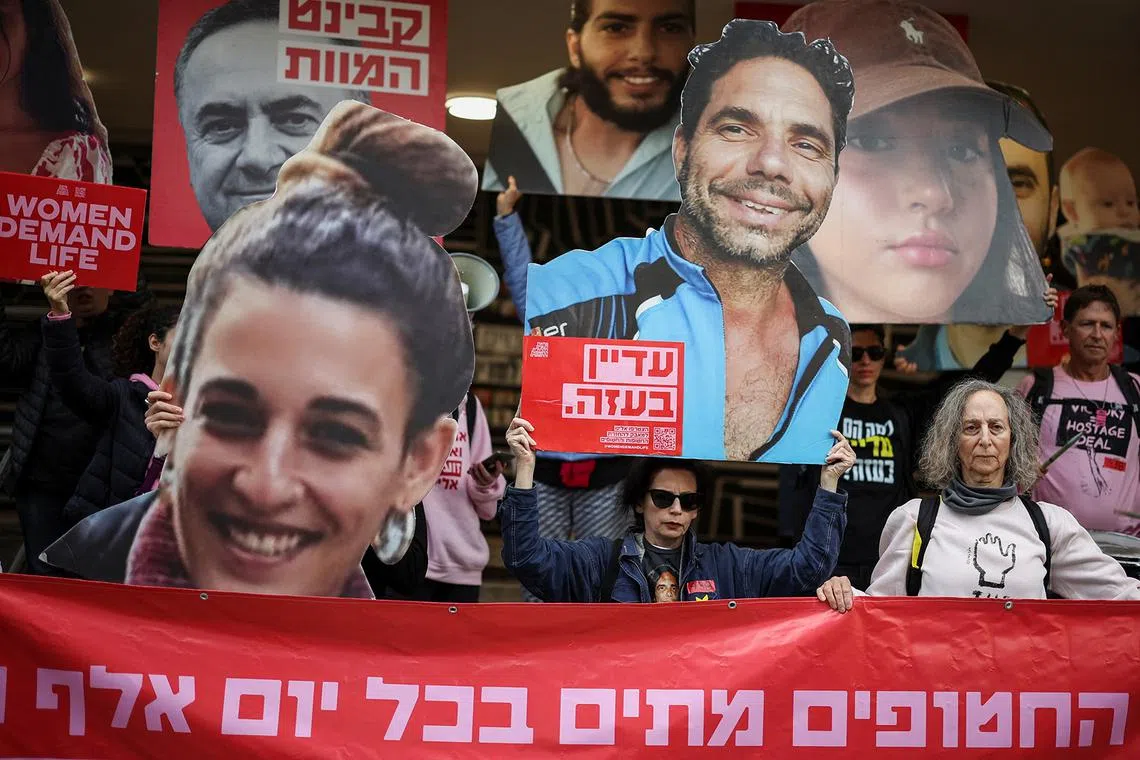 Relatives and supporters of the hostages kidnapped during the deadly Oct 7, 2023 attack by Hamas, holding a protest performance promoting a deal that would bring the hostages home, in Tel Aviv, Israel, Dec 17, 2024. 