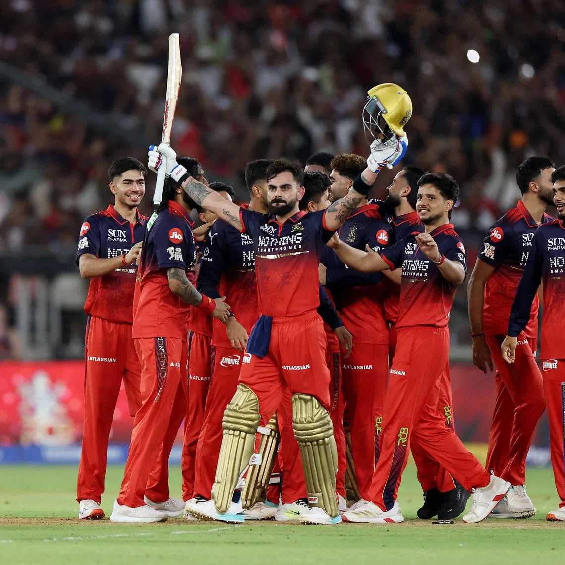 Cricket - Indian Premier League - IPL - Final - Royal Challengers Bengaluru v Gujarat Titans - Narendra Modi Stadium, Ahmedabad, India - May 31, 2026 Royal Challengers Bengaluru's Virat Kohli and teammates celebrate winning the Indian Premier League REUTERS/Amit Dave