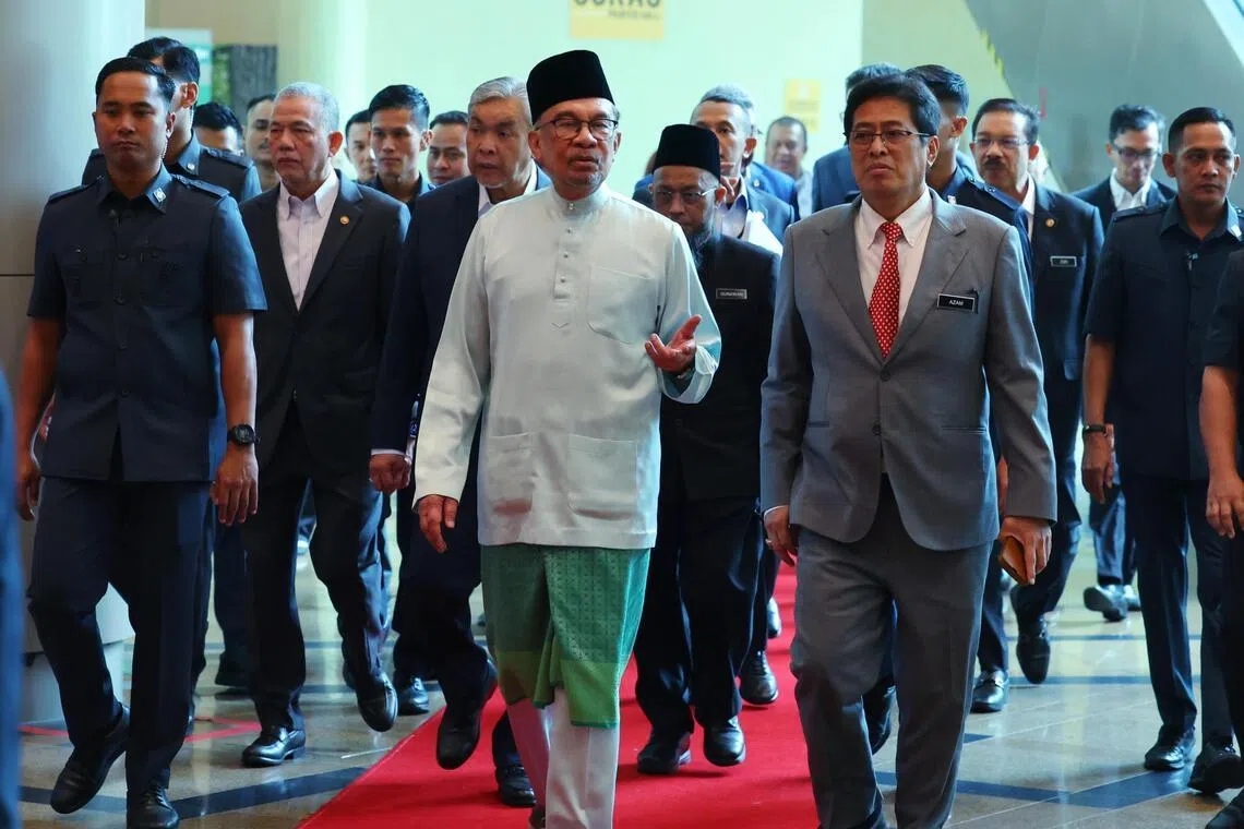 Prime Minister Anwar Ibrahim (left) made fighting corruption a key plank of his regime but allegations of abuse against the Malaysian Anti-Corruption Commission especially against its chief Azam Baki (right) are putting off his reform minded supporters.