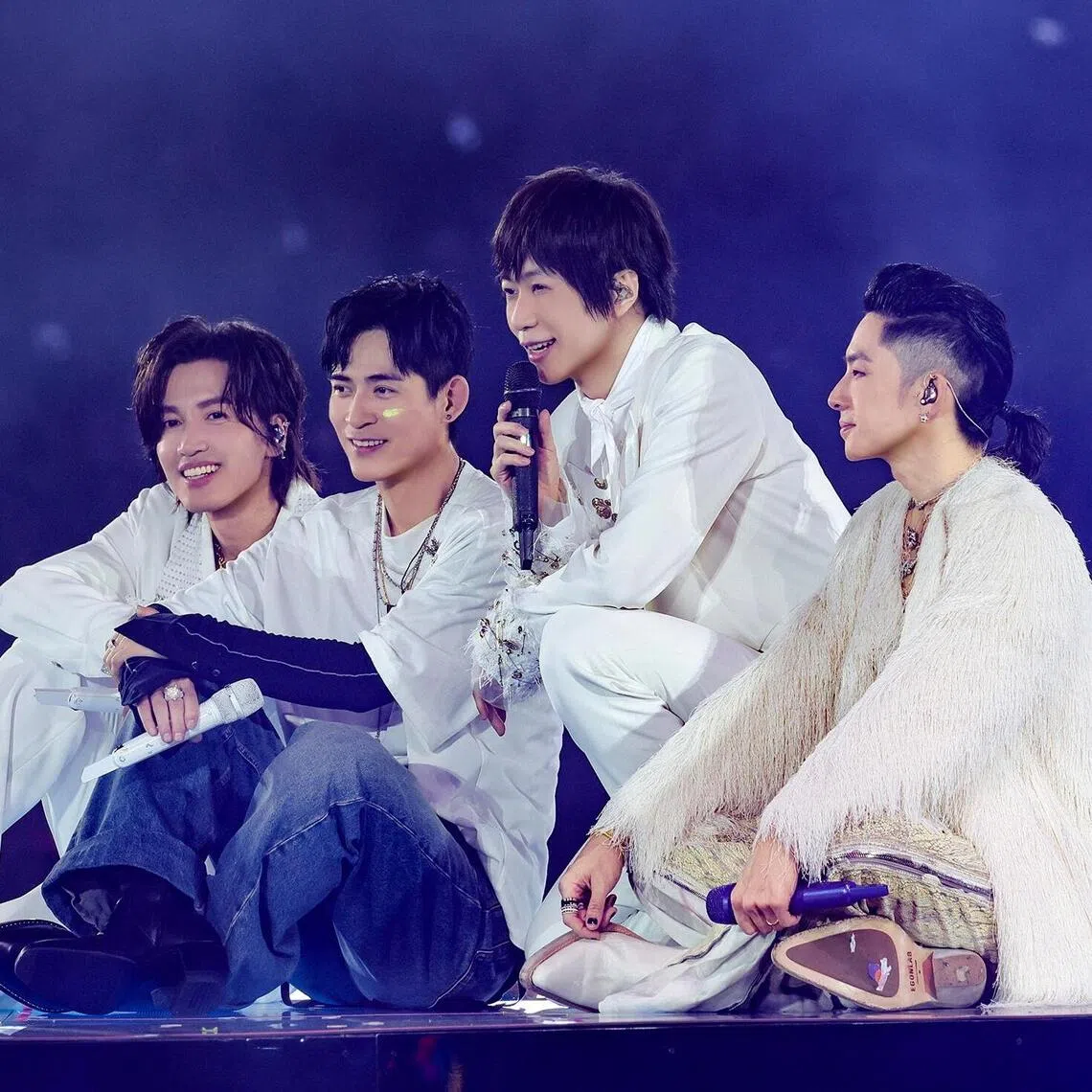 Mayday lead vocalist Ashin (second from right) with (from left) actor-singers Jerry Yan, Vic Chou and Van Ness Wu from Taiwanese drama Meteor Garden during the F*Forever 1st World Tour In Singapore concert on Aug 14.