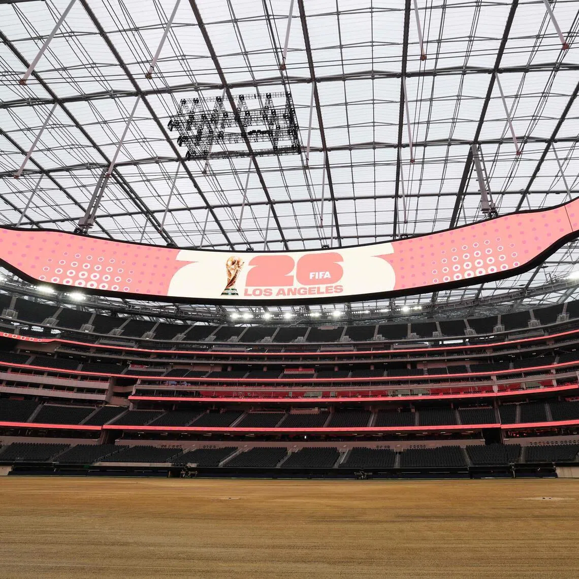 An expanded pitch surface area, which required the removal of corner seating and a raised custom field platform, awaits the installation of grass at Los Angeles’ SoFi Stadium on May 12.