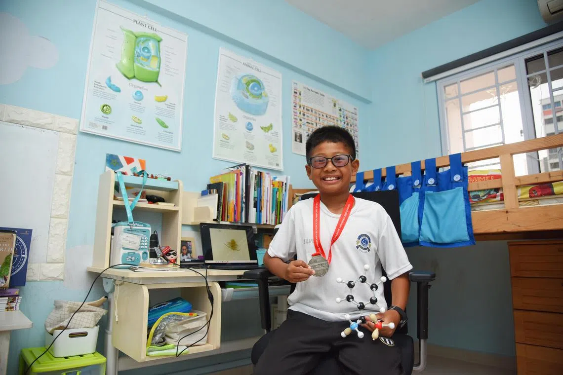 Mohamed Mikail Mohamed Shahrom, 11, struggles to cope in school even though he scored an A for the IGCSE science. 

