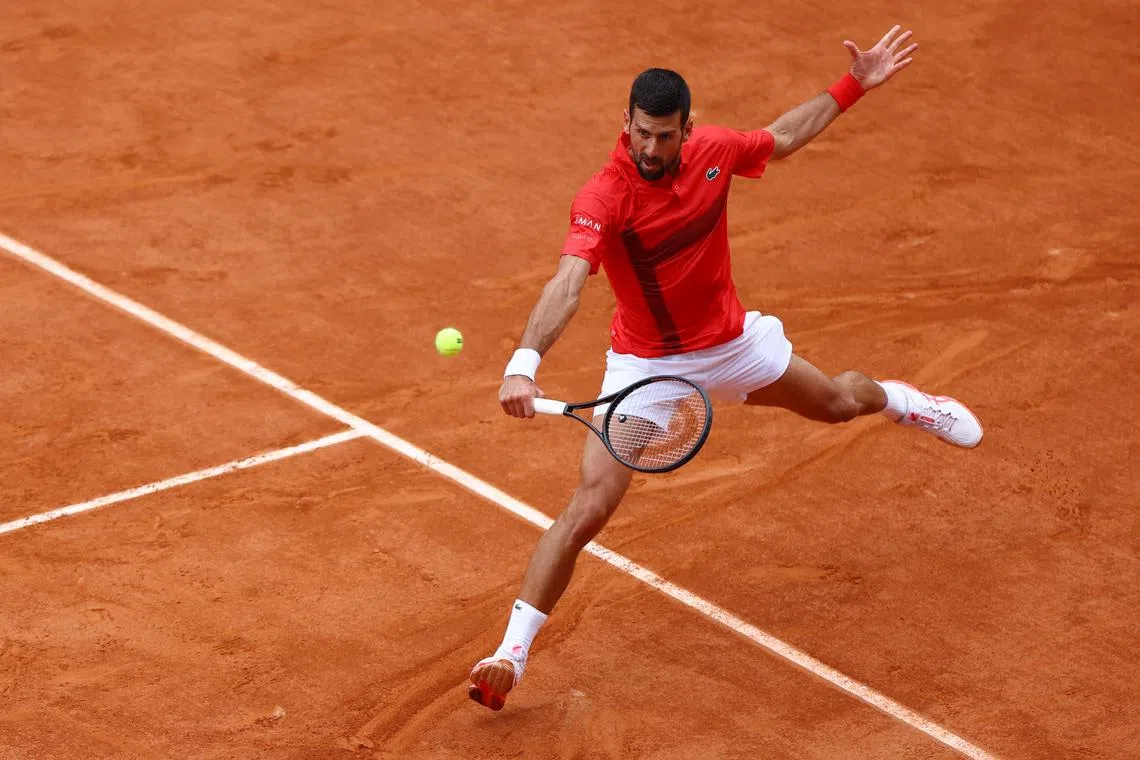 Tennis - French Open - Roland Garros, Paris, France - May 29, 2025 Serbia's Novak Djokovic in action during his second round match against France's Corentin Moutet REUTERS/Lisi Niesner