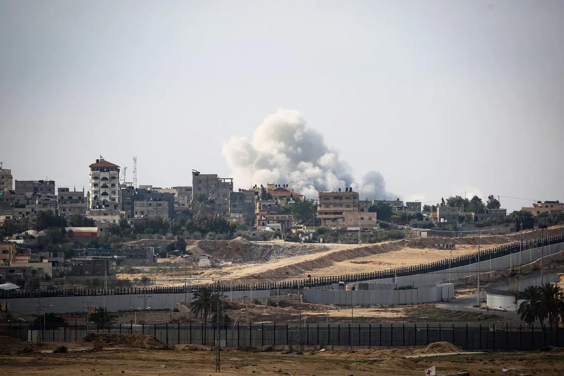 Smoke billows during Israeli strikes in eastern Rafah in the southern Gaza Strip on May 13, 2024, amid the ongoing conflict between Israel and the Palestinian militant group Hamas. 