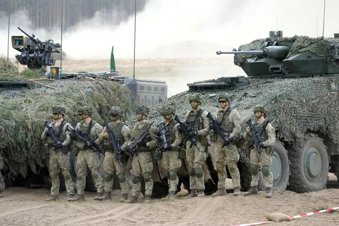 FILE PHOTO: German army servicemen participate in the Quadriga 2024 military exercise in Pabrade, Lithuania May 29, 2024. REUTERS/Ints Kalnins/File Photo
