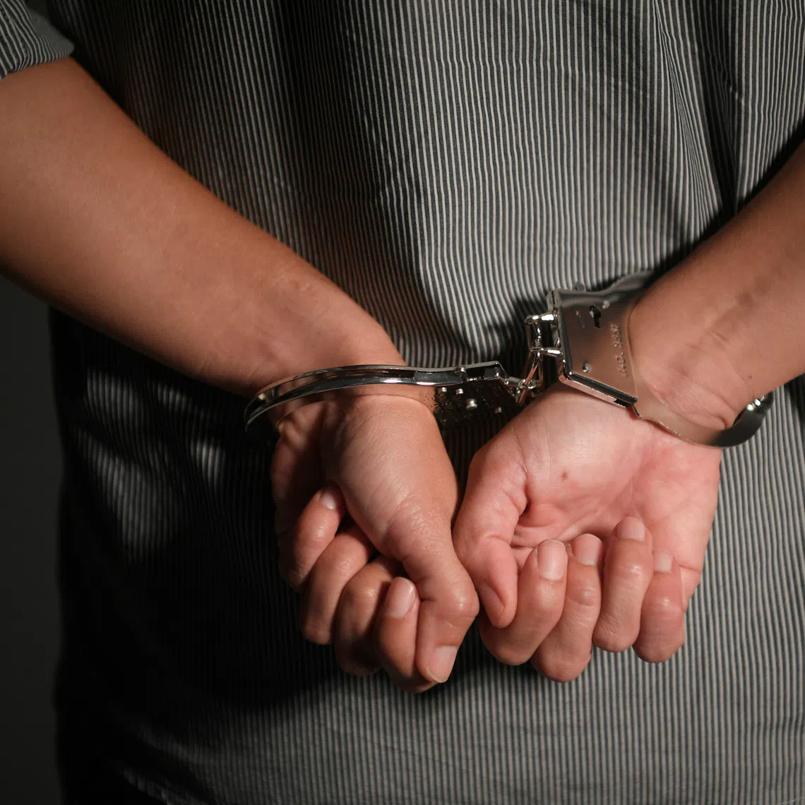 Authorities described the post as making a veiled death threat against the president. 