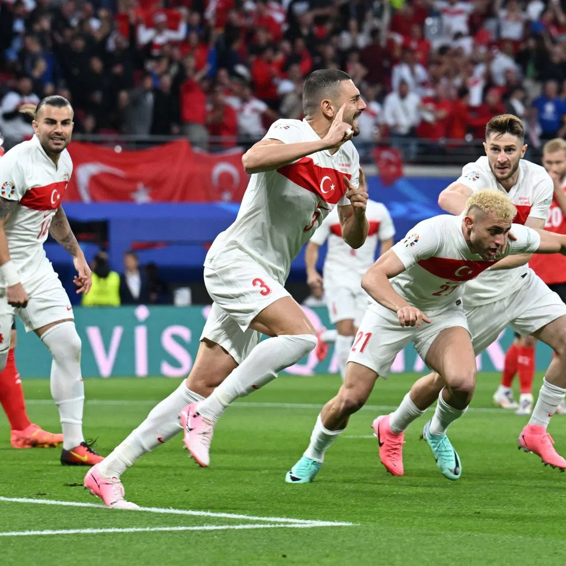 Soccer Football - Euro 2024 - Round of 16 - Austria v Turkey - Leipzig Stadium, Leipzig, Germany - July 2, 2024 Turkey's Merih Demiral celebrates scoring their first goal with teammates REUTERS/Annegret Hilse