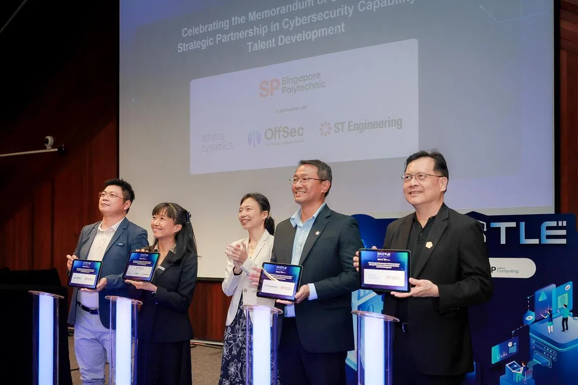 (From left) APAC Regional Director of OffSec Services LLC David Zhao; Deputy Principal of SP Tan Yen Yen; Acting Minister for Manpower Jasmin Lau; Head of Cyber Solutions & Infrastructure of ST Engineering Lim Meng Hwee; and CEO of Athena Dynamics Ken Soh during the launch of the Cybersecurity Assessment and Security Operations Centre Training Lab for Enterprises at Singapore Polytechnic on Aug 19.