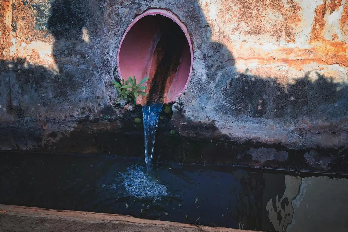 Tan Eng Yong, 41, and Malaysian Lau Kam Wai, 53, were charged with conspiring to sabotage the maintenance of essential water services in an indigenous people’s village.