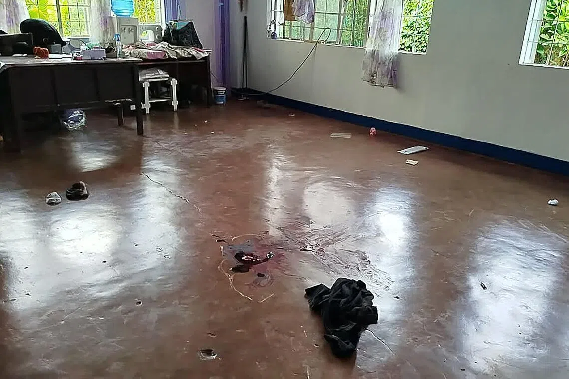 This photo taken on June 22 shows blood on the floor in a classroom after a shooting incident at San Jose High School in Tacloban City, Leyte province in the central Philippines.