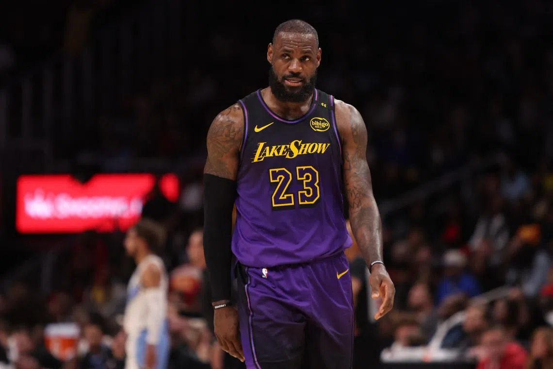 Dec 6, 2024; Atlanta, Georgia, USA; Los Angeles Lakers forward LeBron James (23) in action against the Atlanta Hawks in overtime at State Farm Arena. Mandatory Credit: Brett Davis-Imagn Images