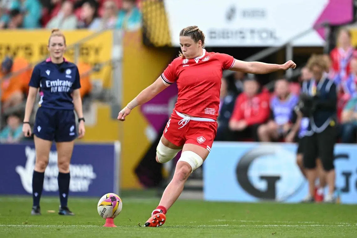 Canada's lock Sophie de Goede kicks a conversion during the Women’s Rugby World Cup quarter-final against Australia at Ashton Gate Stadium, Bristol in England on Sept 13, 2025.