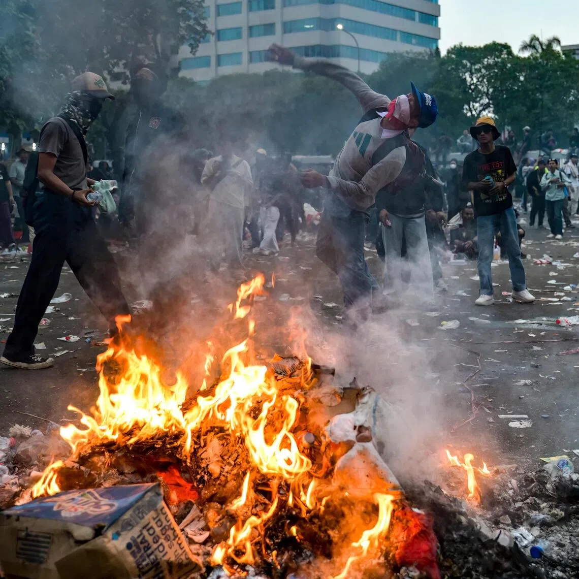 A protester during a demonstration urging lawmakers to immediately pass an asset forfeiture law for corrupt officials outside the Parliament building in Jakarta on Aug 27.