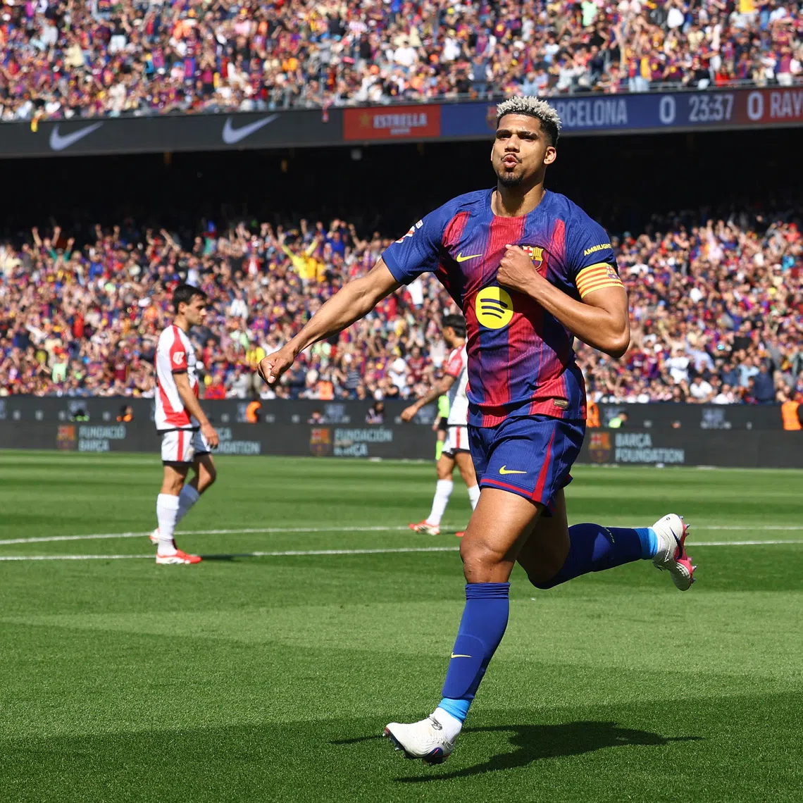 Soccer Football - LaLiga - FC Barcelona v Rayo Vallecano - Spotify Camp Nou, Barcelona, Spain - March 22, 2026 FC Barcelona's Ronald Araujo celebrates scoring their first goal REUTERS/Albert Gea