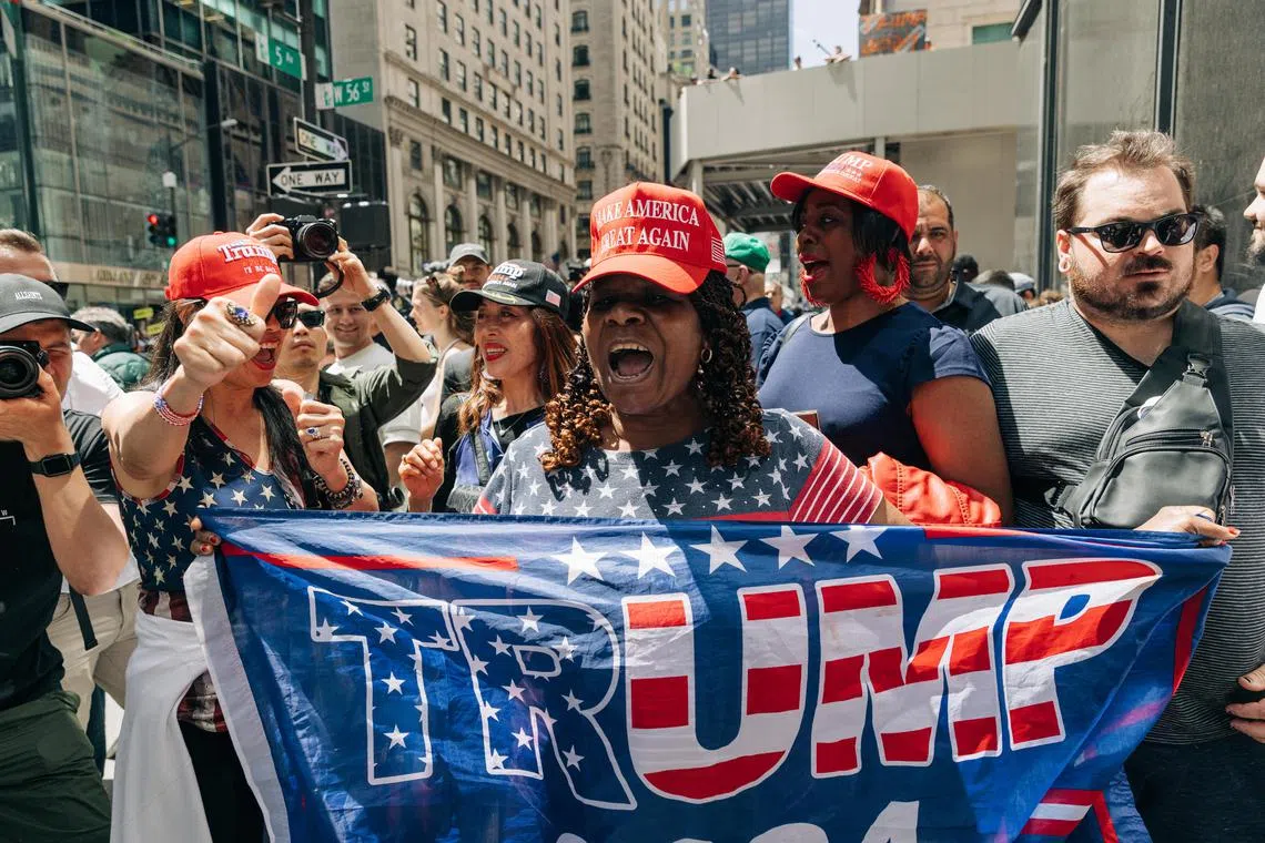 Supporters of former US president Donald Trump outside Trump Tower in New York on May 31, 2024. 