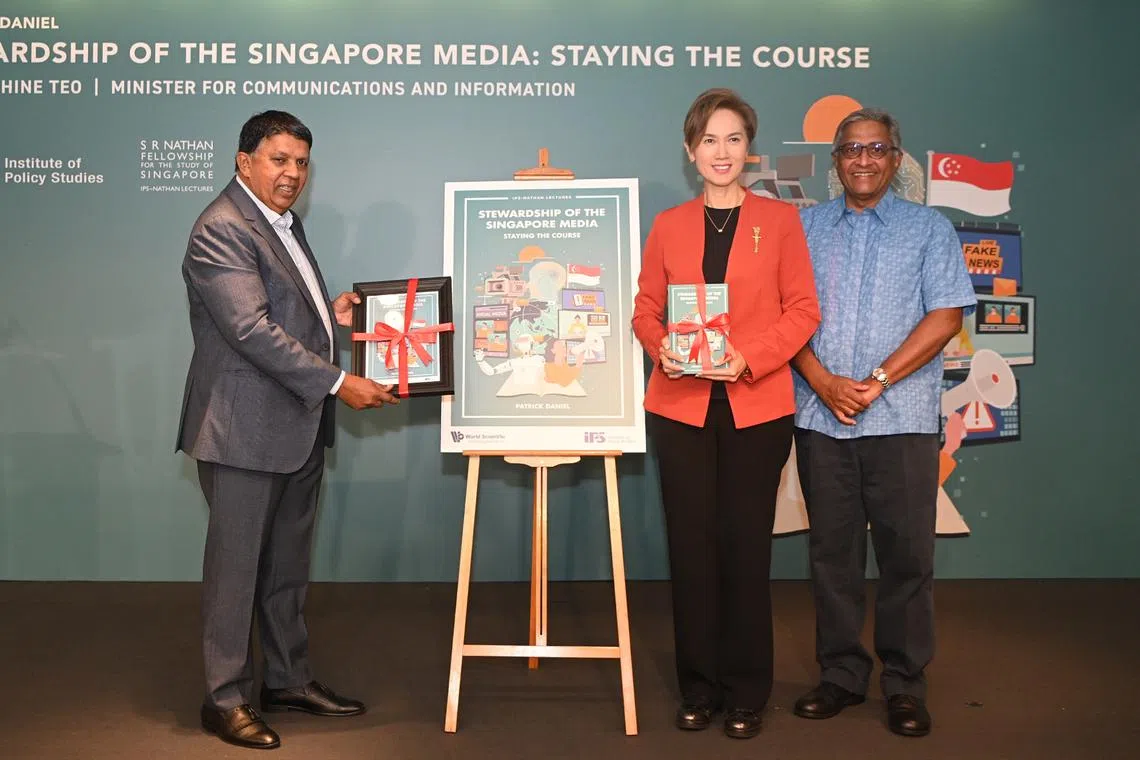 Minister for Communications and Information Josephine Teo and Institute of Policy Studies director Janadas Devan (right) at the launch of Stewardship Of The Singapore Media: Staying The Course by news veteran Patrick Daniel (left).