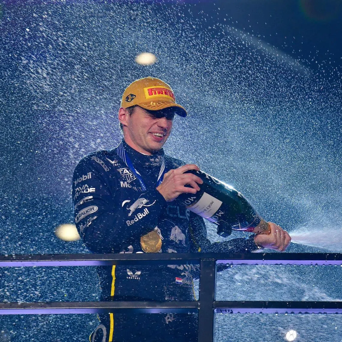 Red Bull driver Max Verstappen celebrates his victory at the Las Vegas Grand Prix.