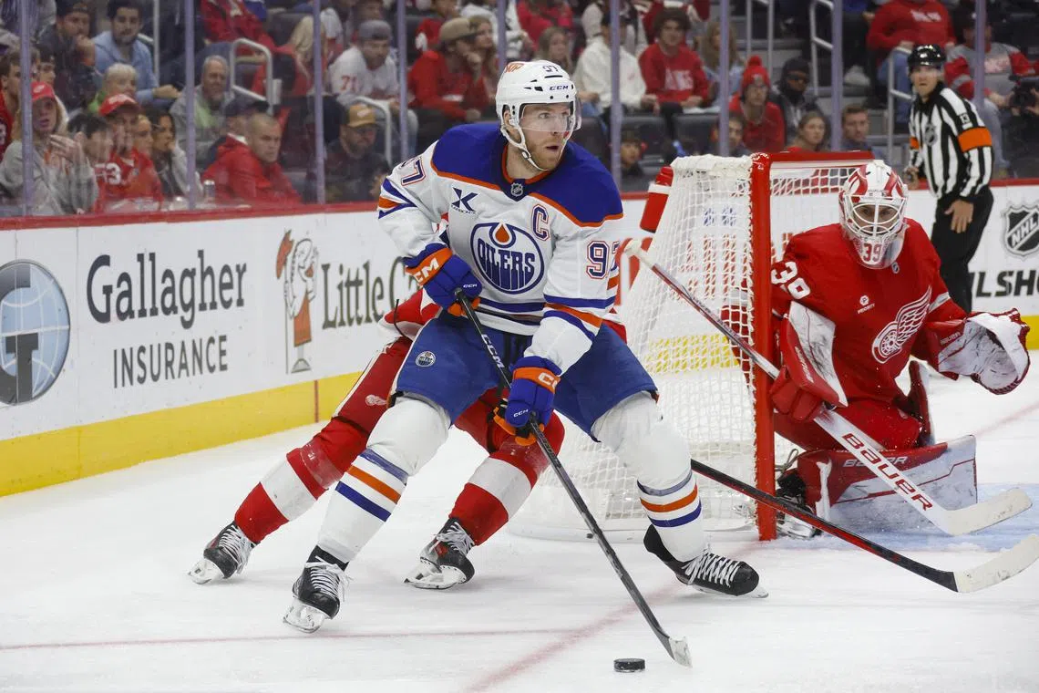 Edmonton Oilers centre Connor McDavid (97) handles the puck in the NHL game against the Detroit Red Wings at Little Caesars Arena in Michigan on Oct 27, 2024.