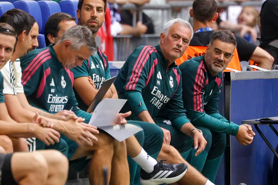 Real Madrid coach Jose Mourinho (centre) is aiming to restore some of the intensity and attitude that defined his first Real reign.