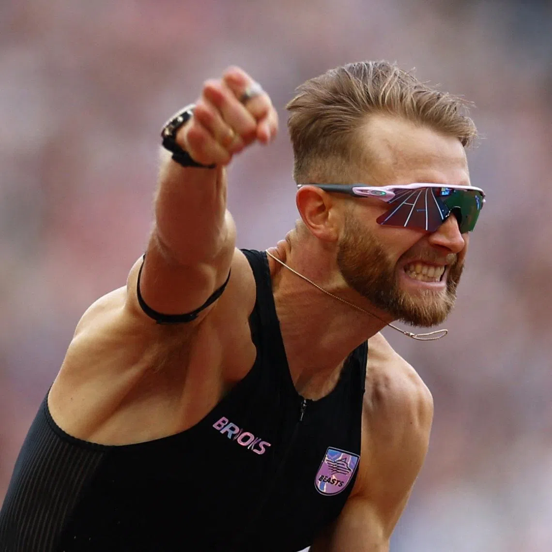 Britain’s Josh Kerr celebrates on July 18 after clocking 3min 42.66sec at the London Diamond League to beat the previous record set in 1999 by Morocco’s Hicham El Guerrouj.