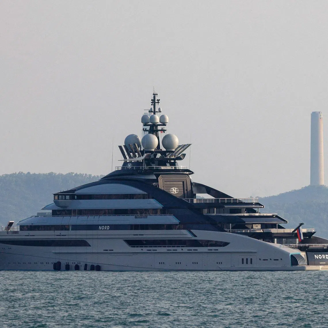 FILE PHOTO: The 465-foot superyacht \"Nord\", linked to the sanctioned Russian oligarch Alexey Mordashov is seen docked, in Hong Kong, China October 7, 2022. REUTERS/Tyrone Siu/File Photo
