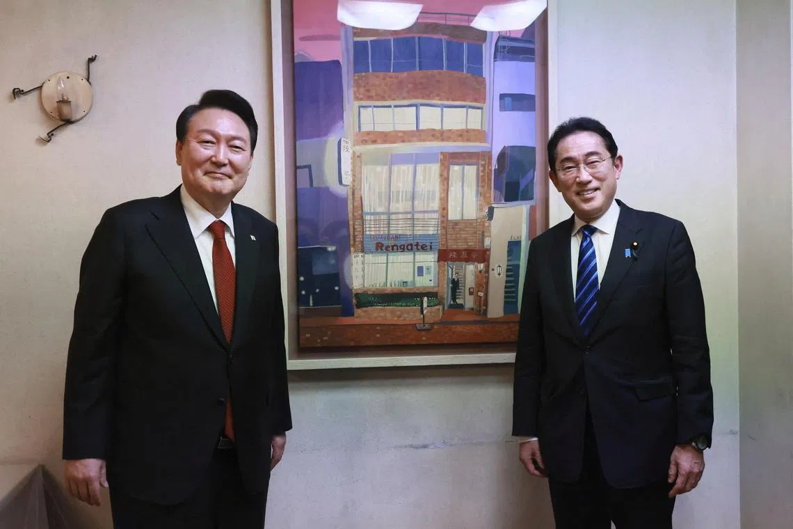 South Korea's President Yoon Suk-yeol (left) and Japanese PM Fumio Kishida hailed a new era of bilateral ties after a summit in Tokyo.