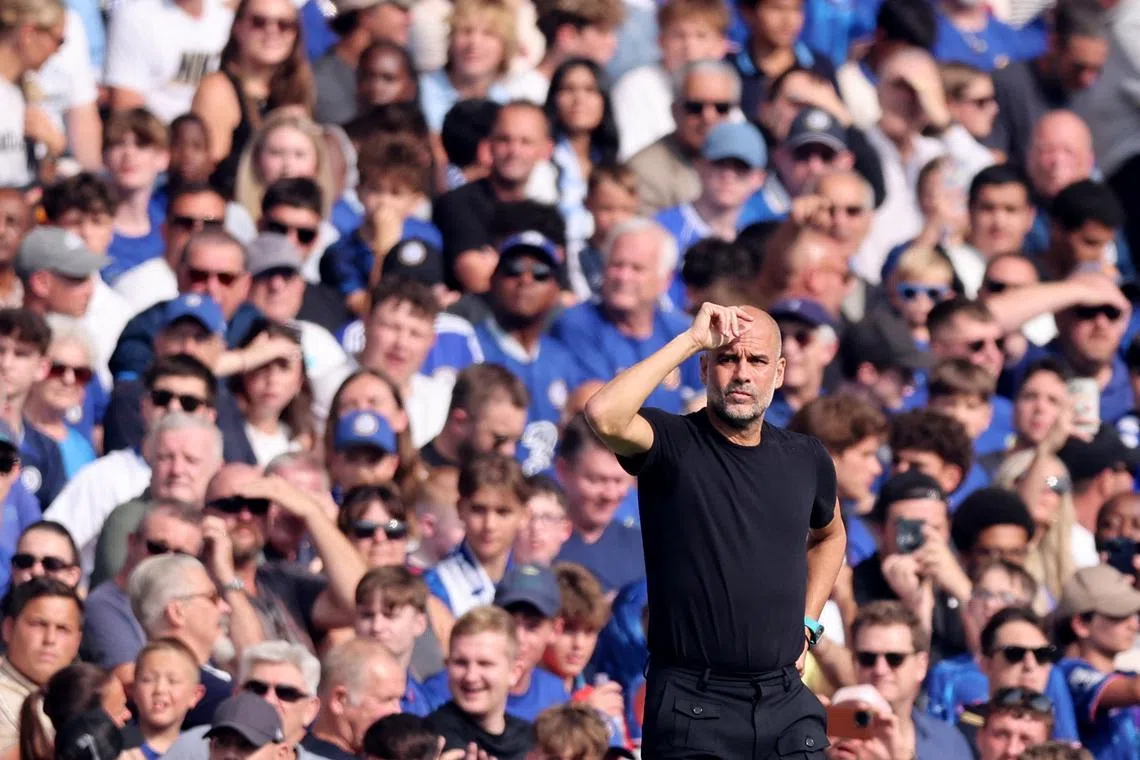 Soccer Football - Premier League - Chelsea v Manchester City - Stamford Bridge, London, Britain - August 18, 2024 Manchester City manager Pep Guardiola reacts during the match REUTERS/David Klein/File Photo